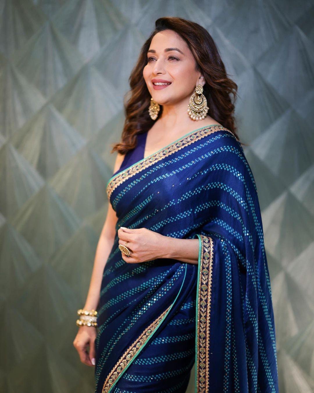 Madhuri Dixit in a saree - Navel Queens