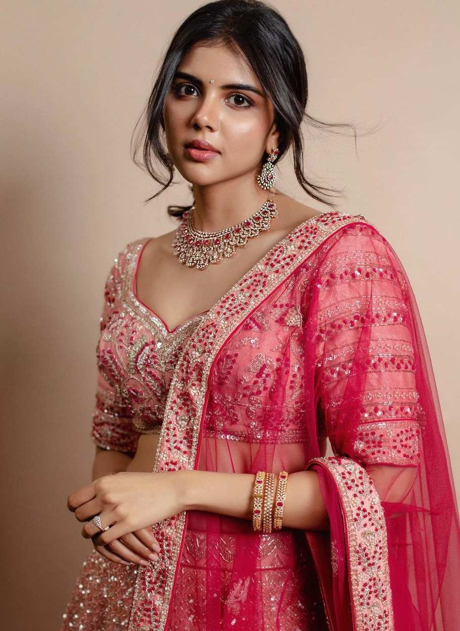 Kalyani Priyadarshan looks effortlessly pretty in a pink bridal ...