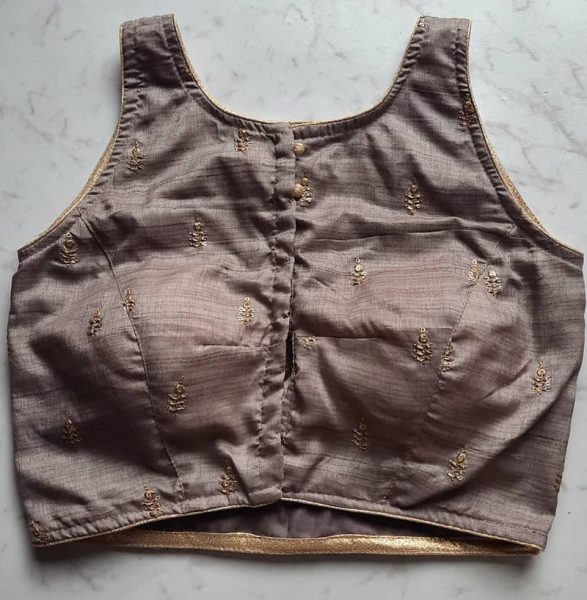 Check out these 20 modern sleeveless blouse designs!