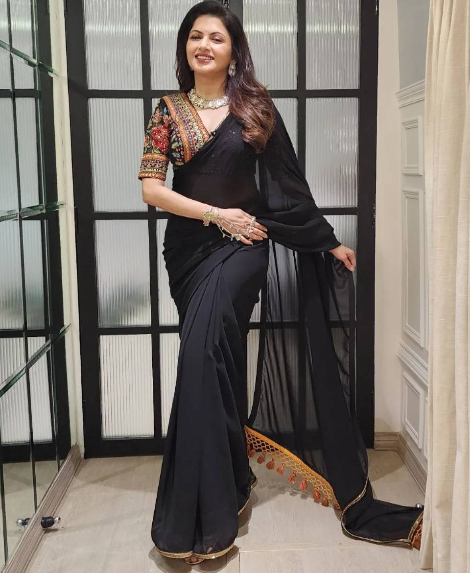 Bhagyashree looks beautiful in a black sheer saree and embroidered ...
