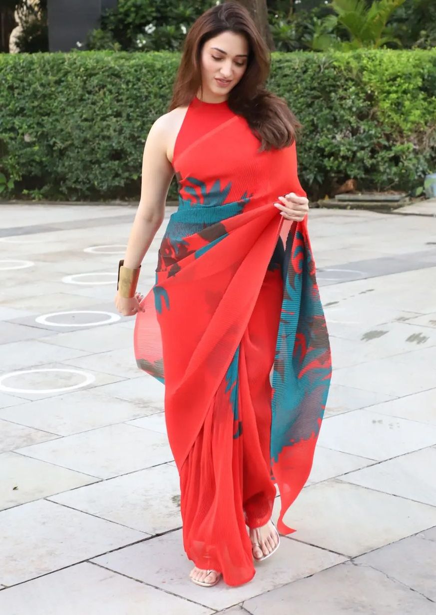 Tamannaah Bhatia in a red pleated saree at "Babli Bouncer" screening!