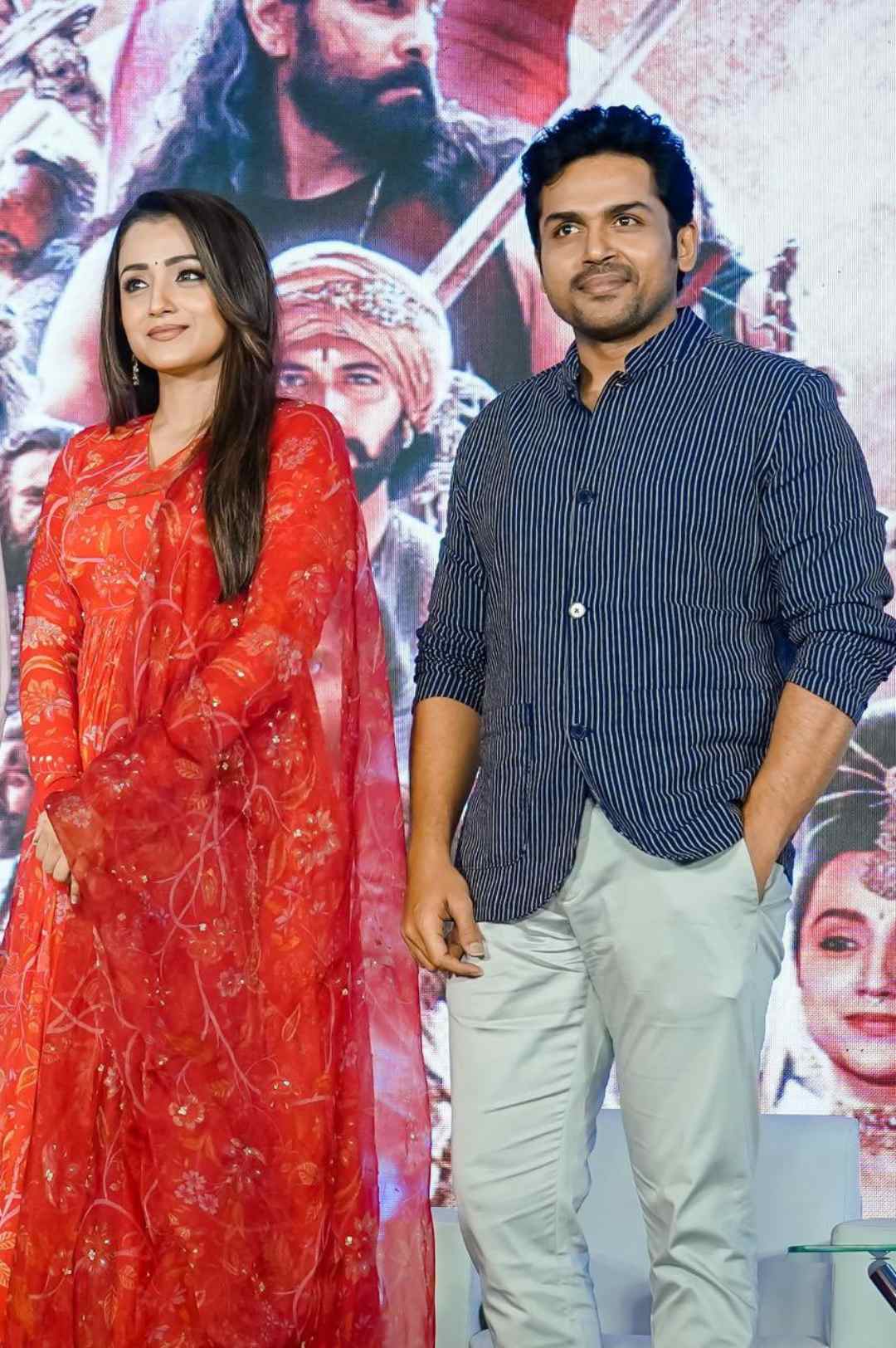 trisha krishnan in red anarkali for ps1 promotions0.5