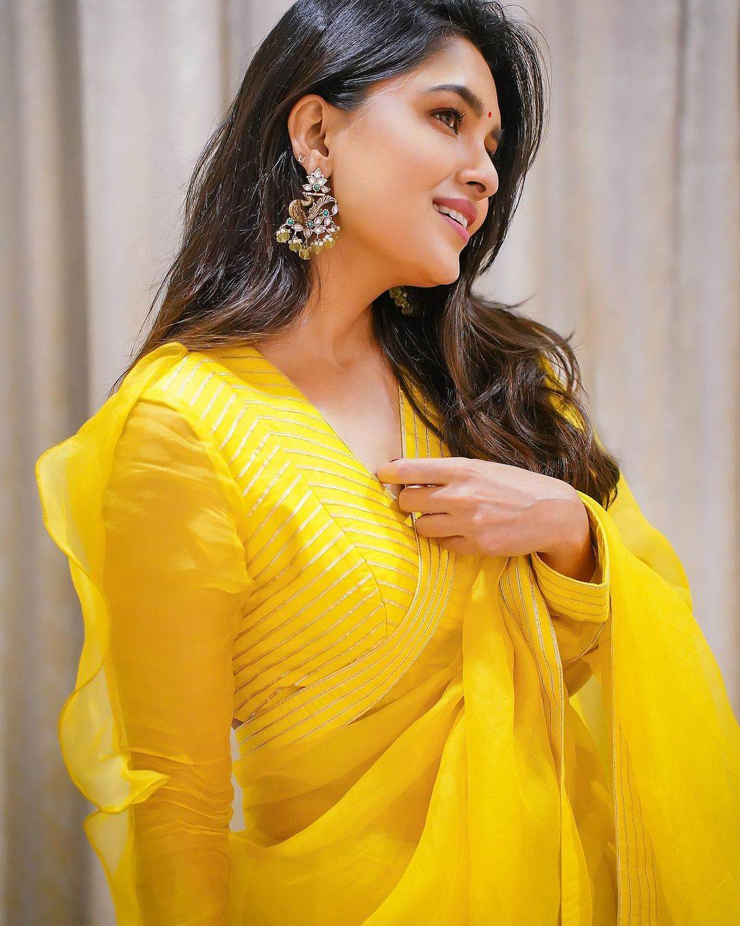 This yellow organza saree worn by Vani Bhojan should be your next
