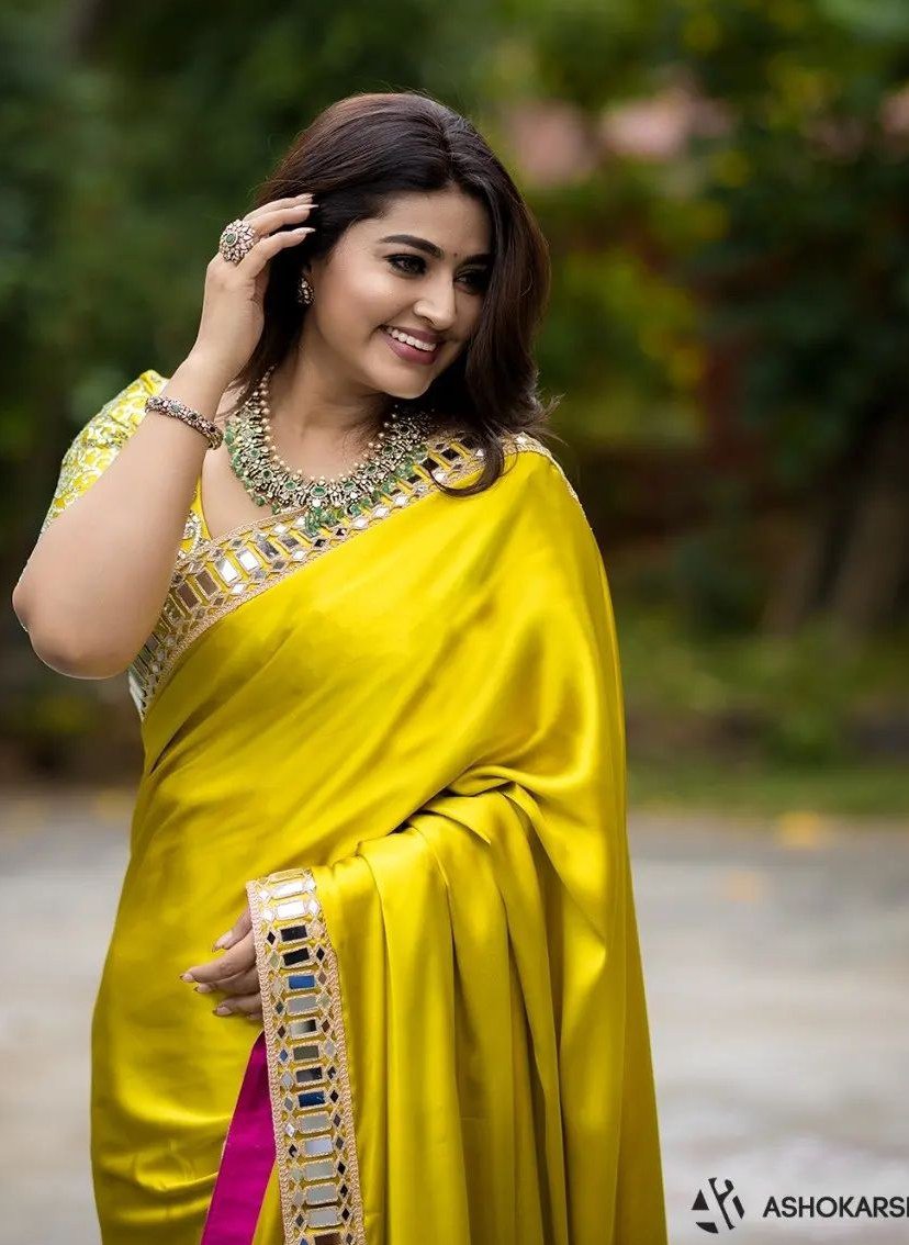 Sneha Prasanna brightens our day in a lime green satin silk saree!