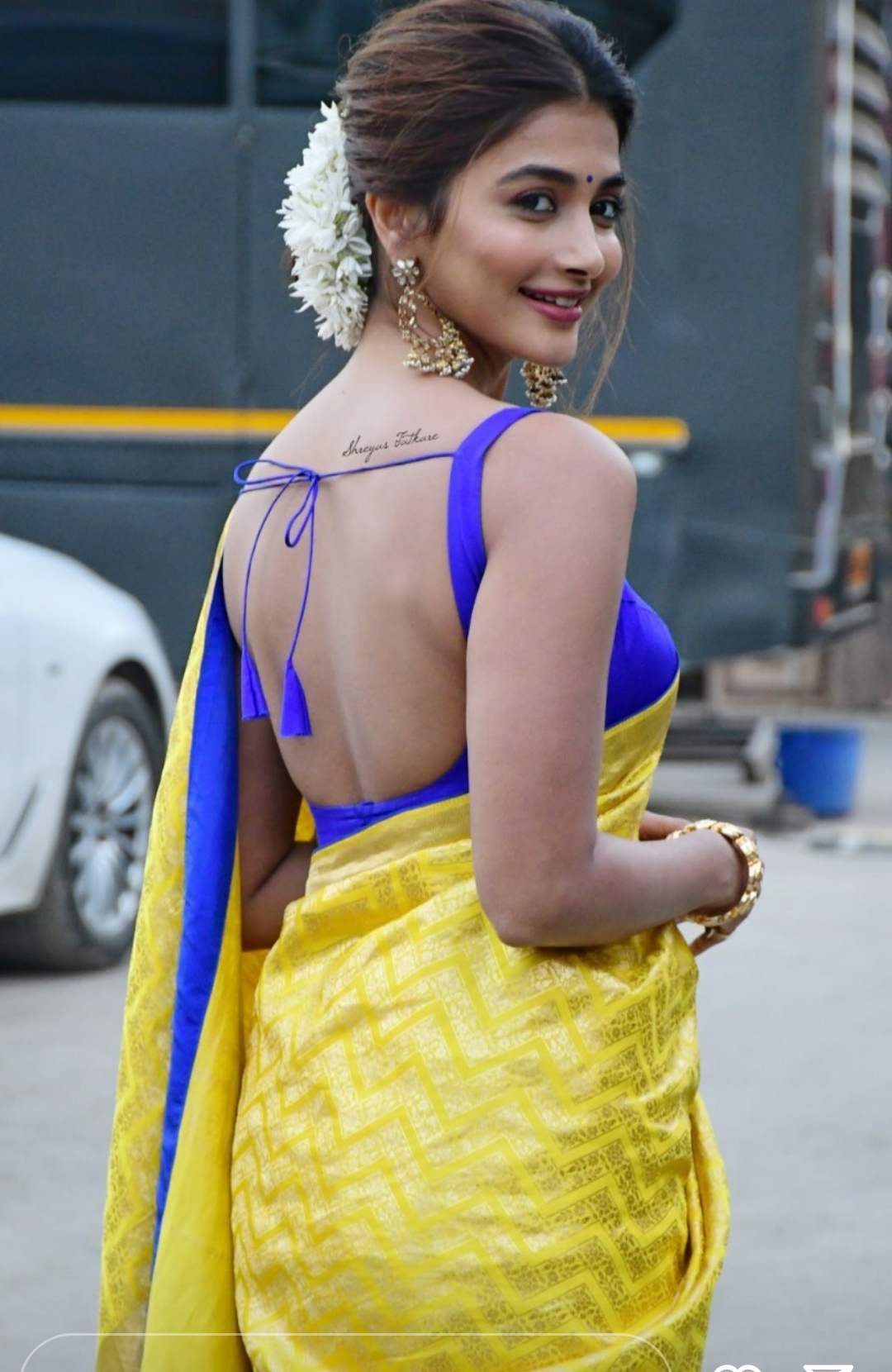 Pooja Hegde aces her traditional look in a yellow silk saree for ...