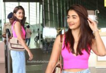 pooje hegde airport look blue jeans and pink top (1)